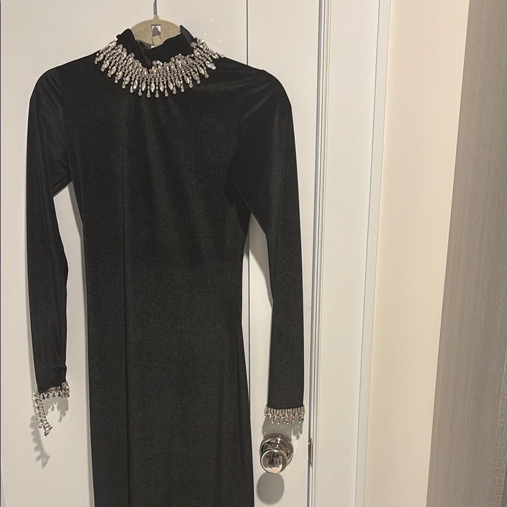 Elegant Black Dress with Embellished Neckline